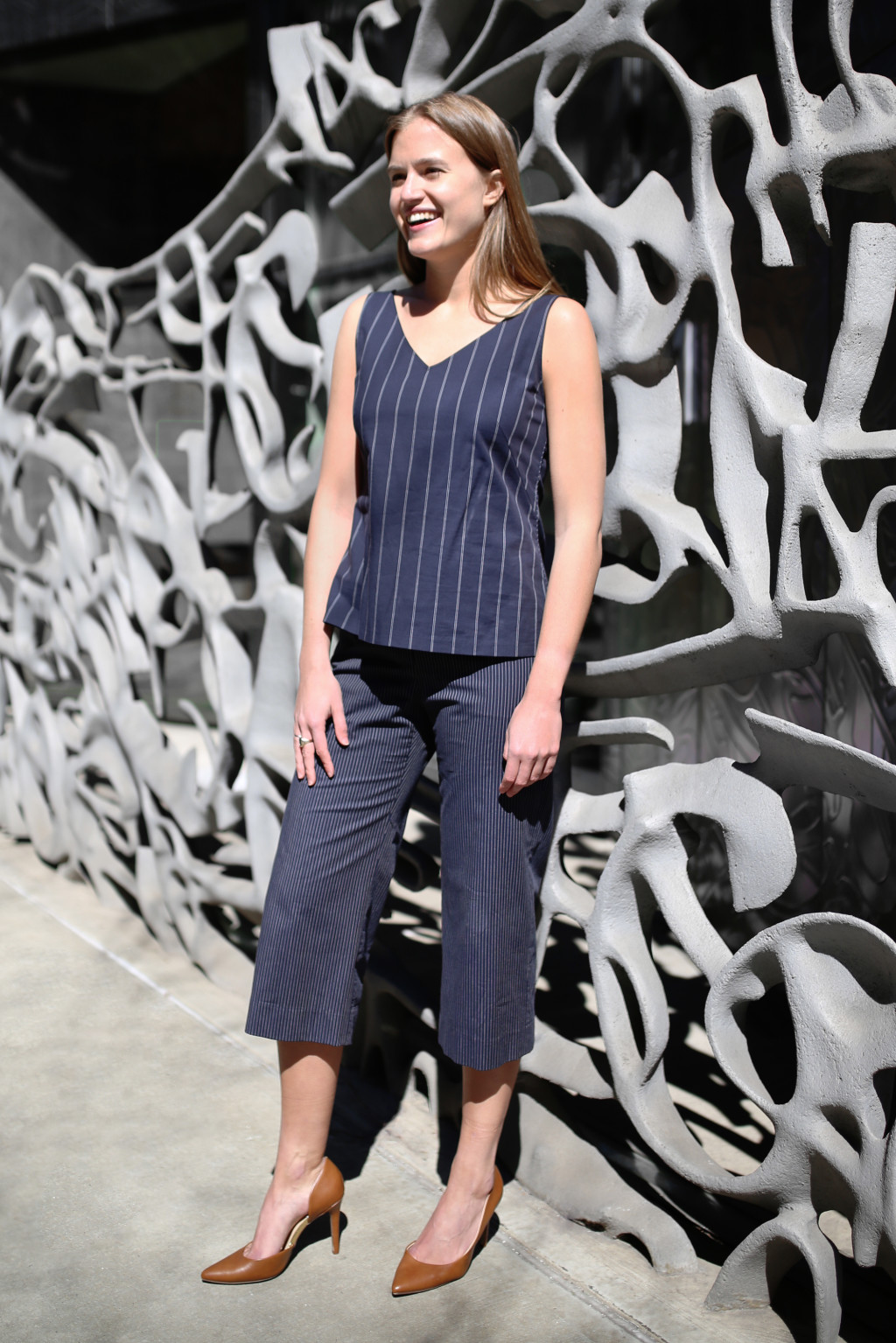 Annabel wears the Pippa pant in chalk stripe with the Crawford top in double stripe.